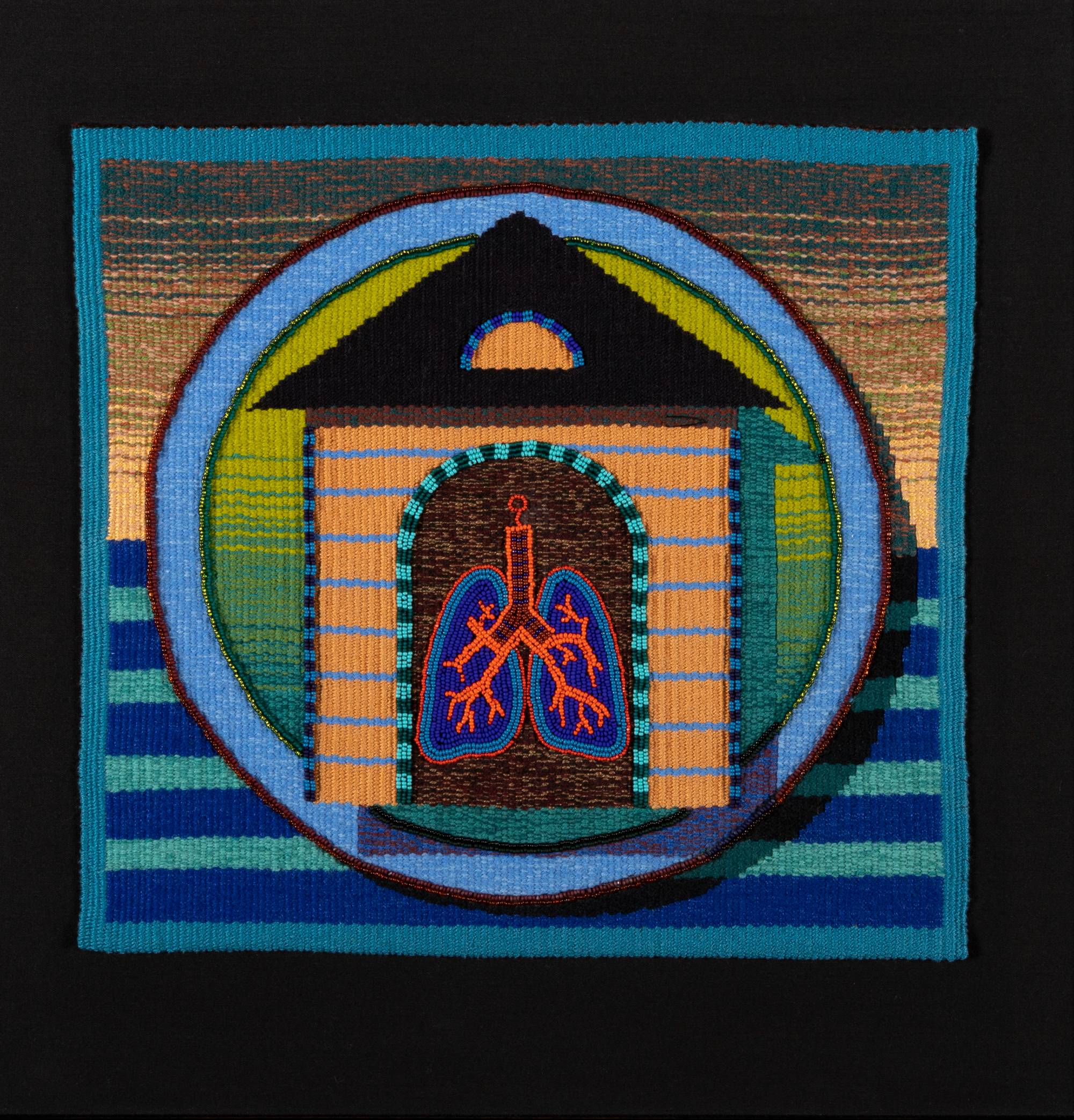 Woven textile wiht an image of a house or building. Lungs are stitched and beaded on top of the house.
